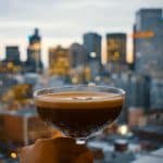 Roof top martini overlooking Melbourne skyline, possible with luggage storage