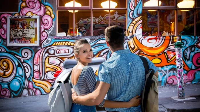 Couple in Hosier Lane enjoying Melbourne bag-free — BagBoyz locker alternative case studies